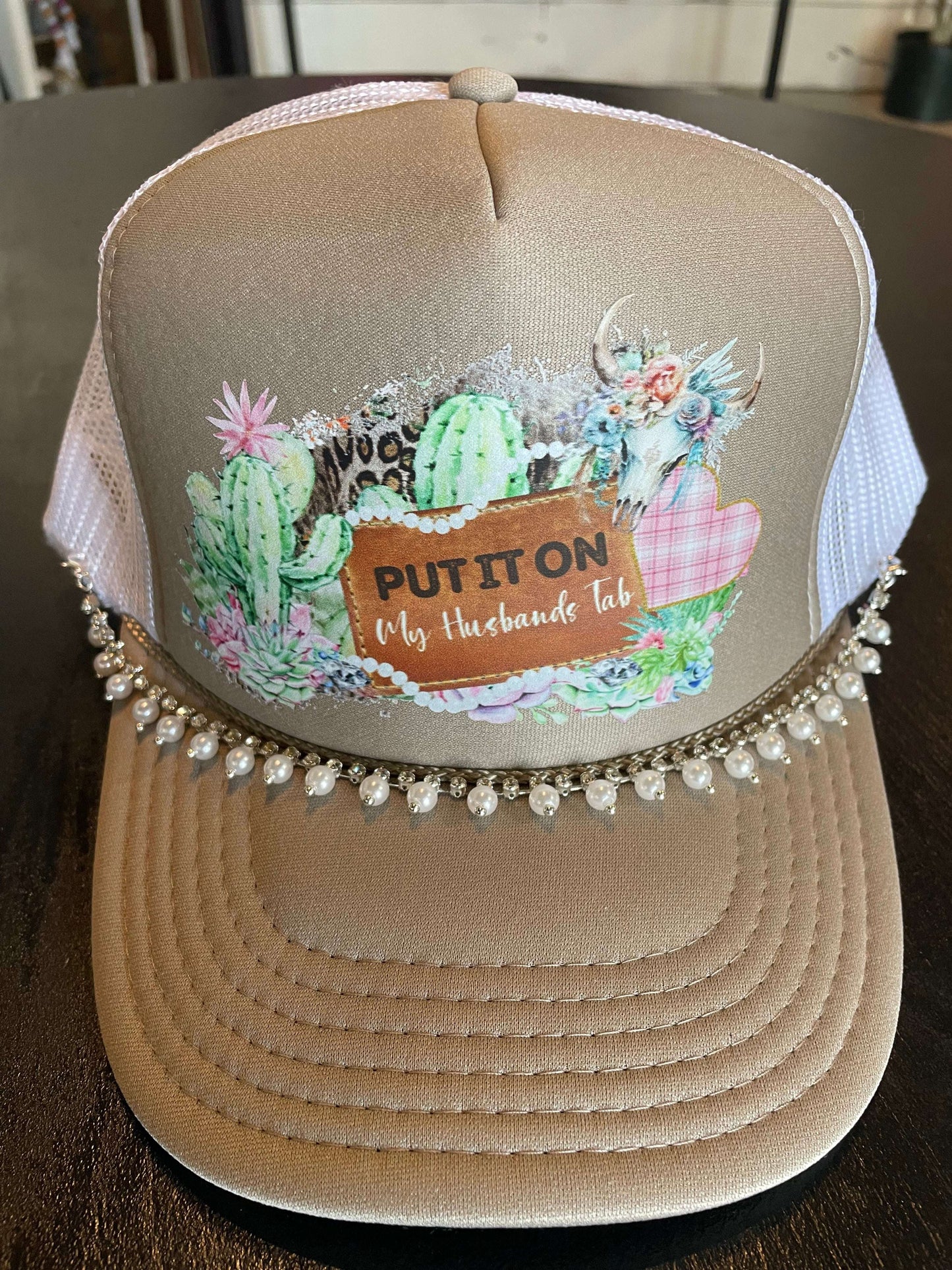 Put It On My Husbands Tab Trucker Hat