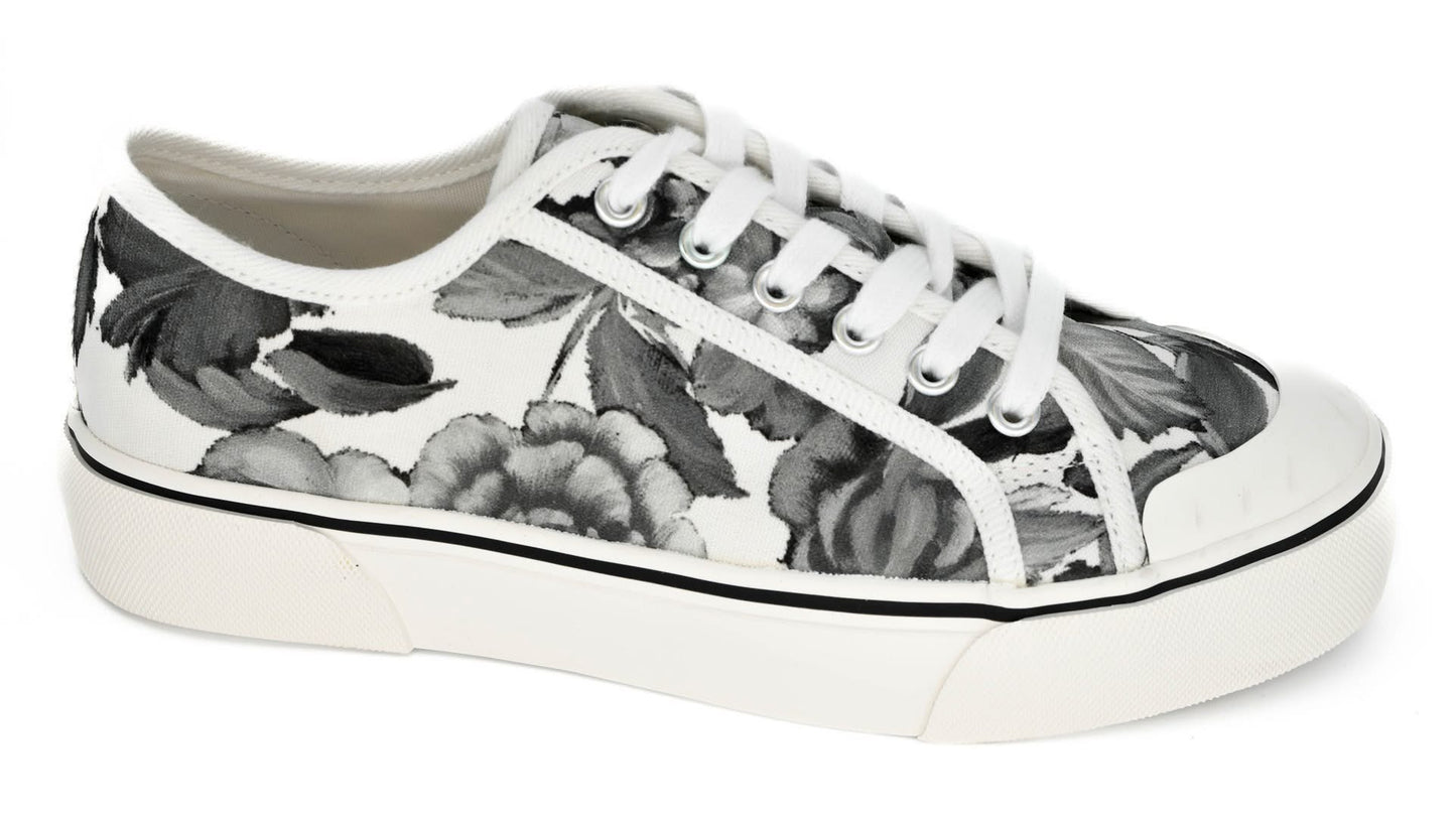Floral-patterned sneaker on a white background