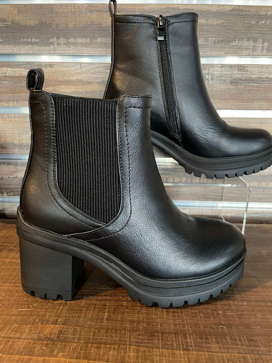 Corkys Trust Issues Bootie in Black with 2.75-inch heel, full inside zip, and soft cushioned insole—chic comfort for day-to-night wear