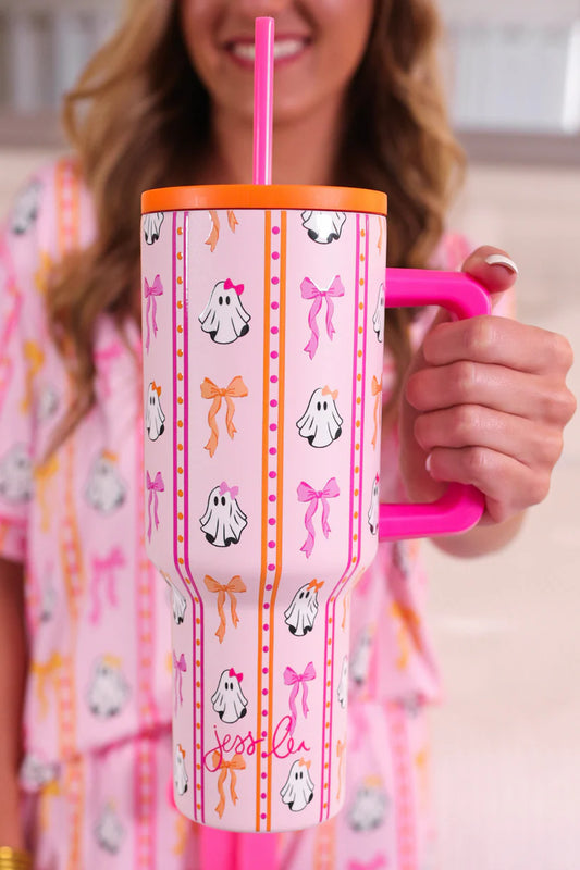 pink tumbler with ghost and bow design