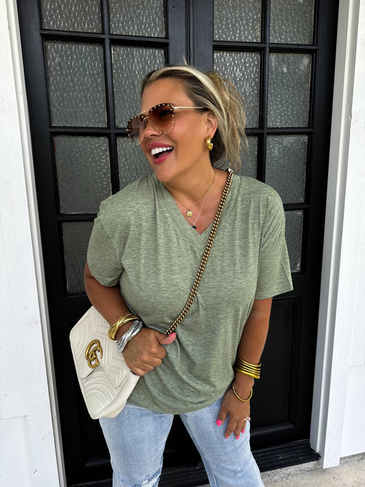 Green Loose-fitting boyfriend tee with deep V-neck and soft jersey slub fabric—perfect for layering or casual wear