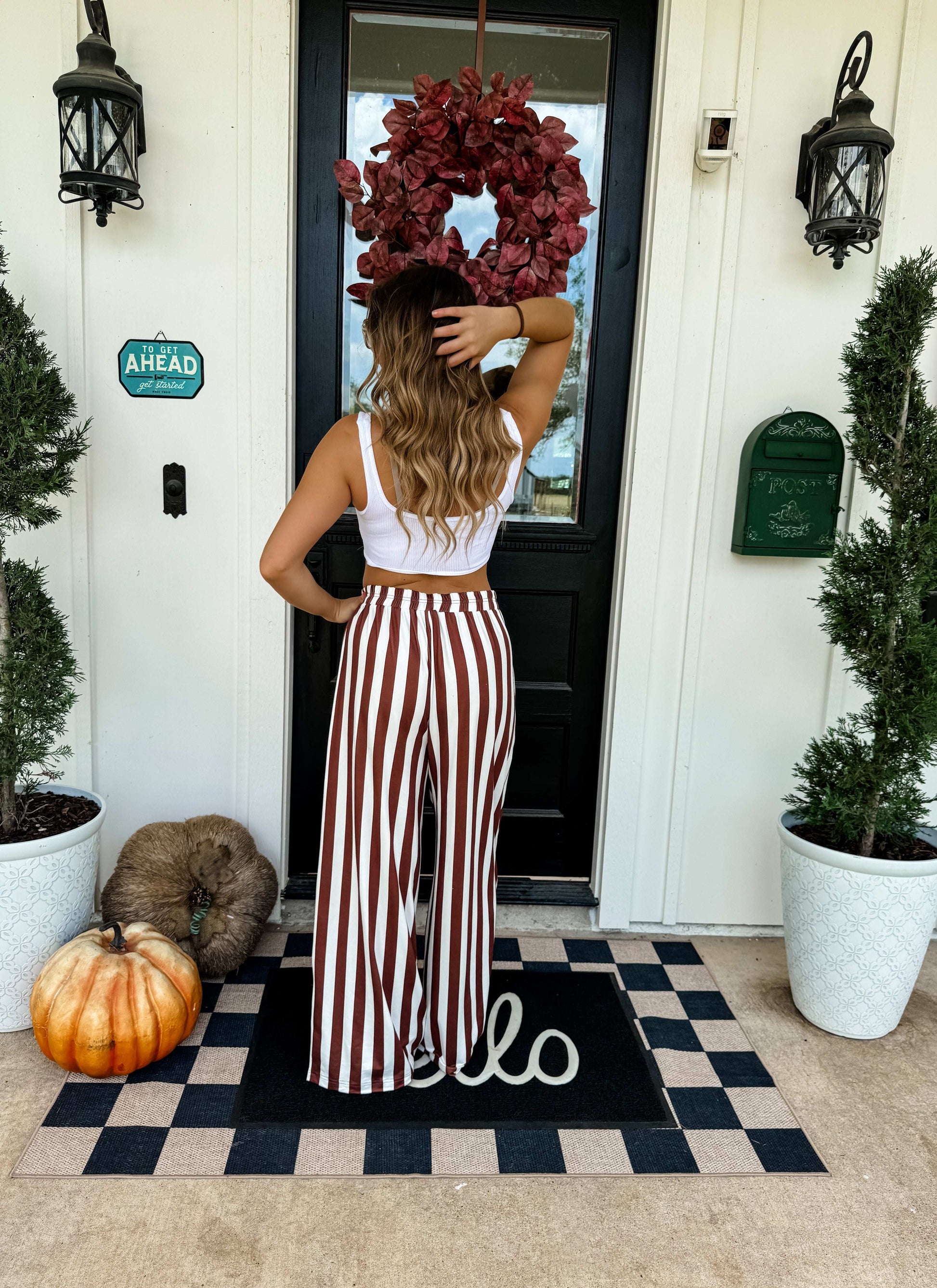 Black and white stipe pants back view