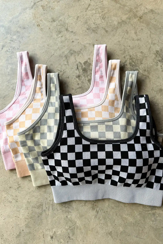 Black and grey checker patterned bralette with seamless scoop back, removable pads, and ultra-stretchy ribbed knit fabric for supportive comfort