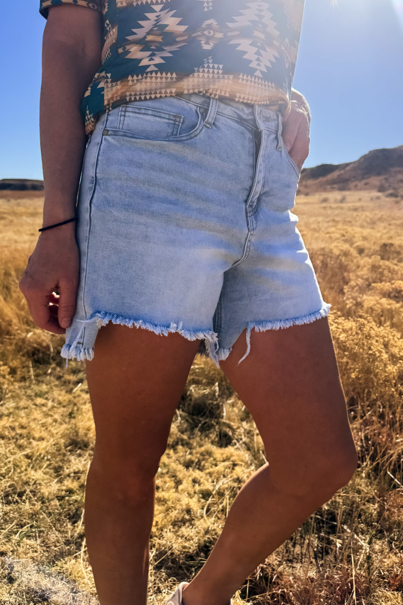 Light Wash Denim Shorts with Asymmetrical Hem