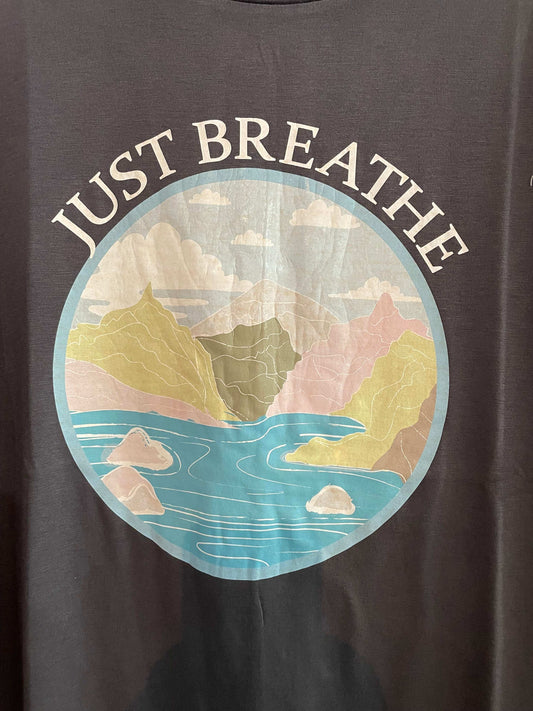 Charcoal t-shirt with 'Just Breathe' graphic design featuring a colorful abstract pattern.