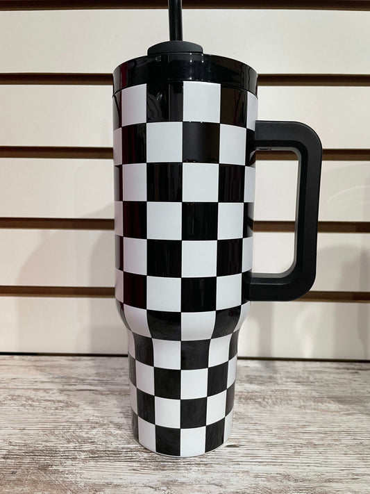 Black and white checkered tumbler with insulated design for keeping drinks cool in style