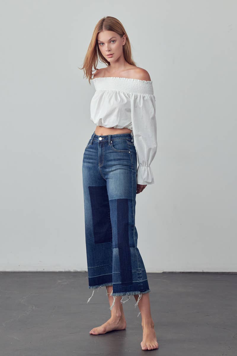 Mid Rise Raw Hem Crop Flare Jeans