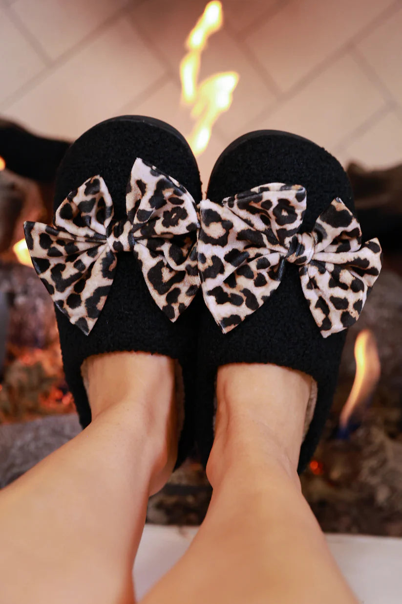 Black slippers with leopard print bows