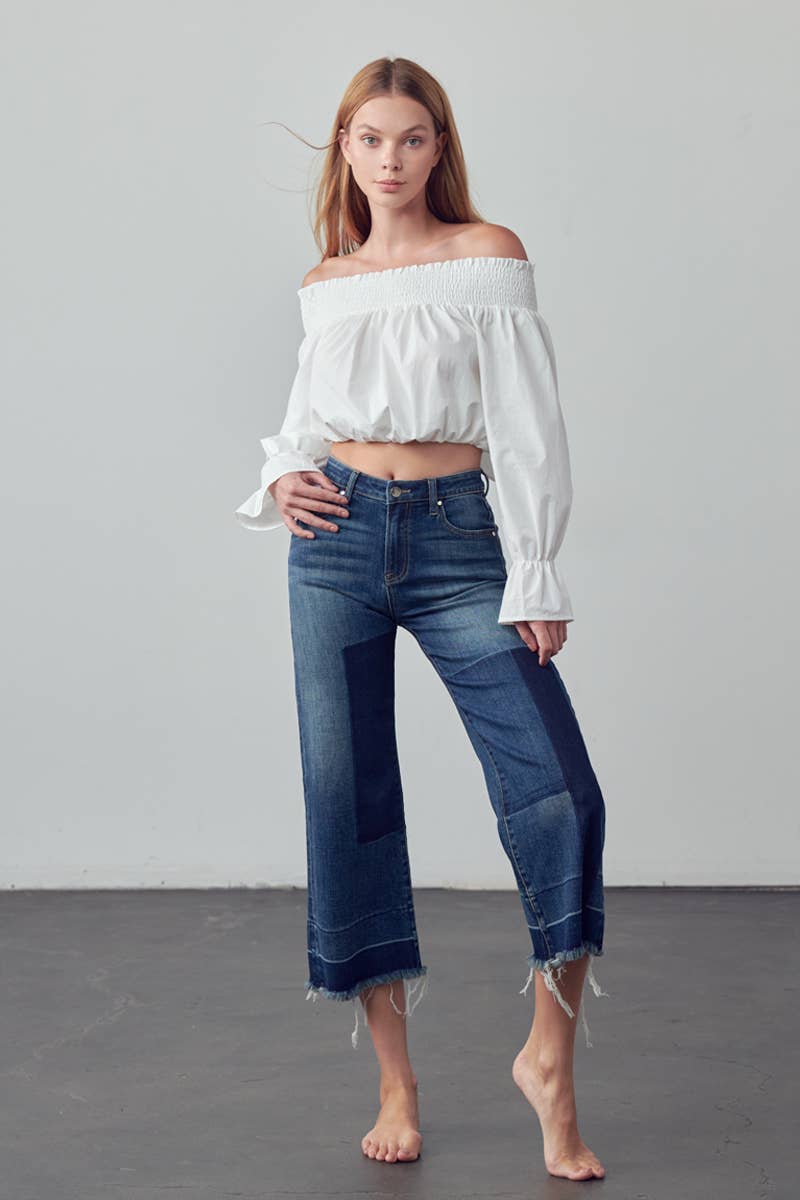 Mid Rise Raw Hem Crop Flare Jeans